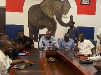 National Youth Organizer of the New Patriotic Party (NPP), Salam Mustapha (behind the microphones)