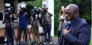 Congo's former president Joseph Kabila leaves after briefing members of the media
