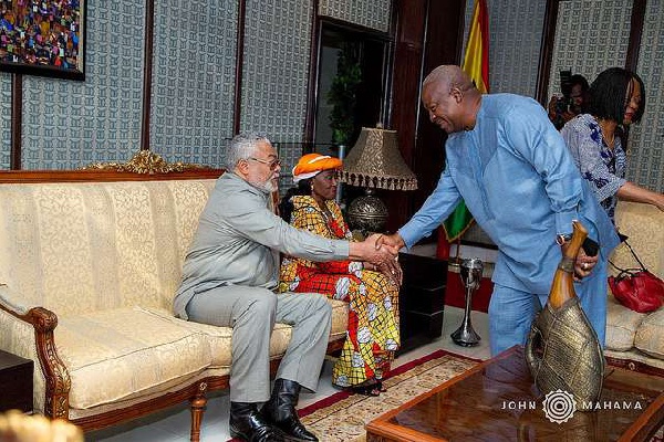 Mahama exchanges pleasantries with the Rawlings'