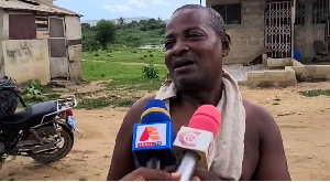 A resident speaking to the media