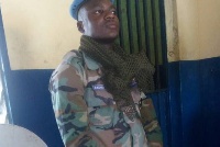 One of the eight men who were arrested for posing as soldiers