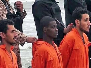 Screenshot from Askghmedia showing Ayariga (middle) of two Egyptian Coptic Christians