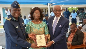 Wing Commander Andy Mensah (left) receiving his award