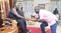 Okyehene, Osagyefuo Nana Amoatia Ofori Panin exchanging pleasantries with Daryl Bosu
