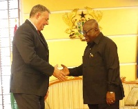 President Akufo-Addo in a handshake with out-going French Ambassador to Ghana, Francois Pujolas