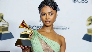 The Grammy-winning singer did not disclose the nature of the injury