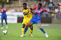 Thomas Boakye in a tussle for the ball