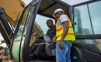 President John Dramani Mahama at construction site.