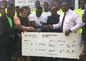 Bechem United officials receiving the sponsorship package from Delta Airlines