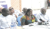 Miss Priscilla Torgbor (middle) addressing the press in Accra.