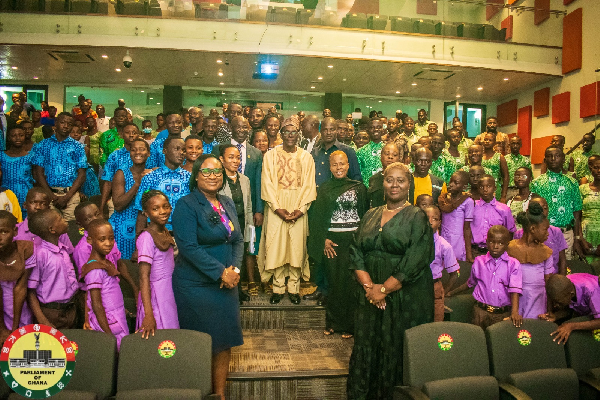 Dr Bandim with Speaker of Parliament Alban Bagbin and some BECE candidates at parliament