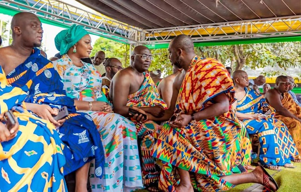 Dr. Mathew Opoku Prempeh kneeling before Mahamudu Bawumia and other dignitaries