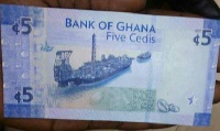 The cedi traded against the dollar at a mid-rate of 5.7472
