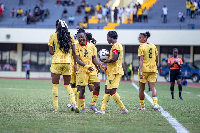 Players of the Black Queens celebrating a goal