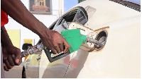 Fuel attendant fueling a vehicle