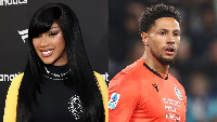A photo of American rapper Cardi B and Nigeria's Maduka Okoye
