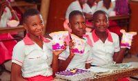 File photo: Girls holding sanitary pads