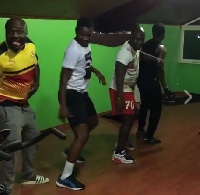 Asamoah Gyan (2nd Left) exhibits 'killer' dance moves