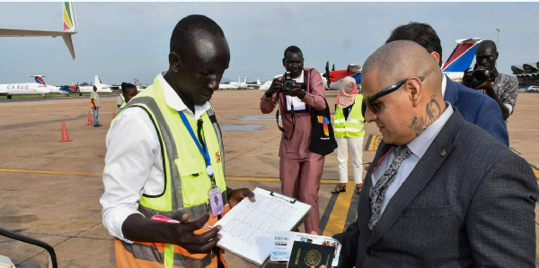 Jesus Muñoz-Gutierrez  undergoes processing prior to repatriation at the Juba International Airport