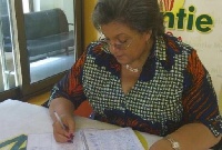 Foreign Affairs Minister Hanna Tetteh signing the petition