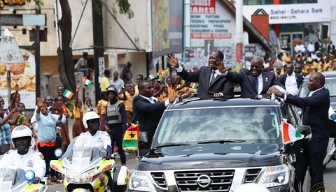 President Nana Addo Dankwa Akufo-Addo and President Alassane Ouattara waving to the people