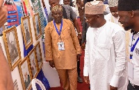 Vice President Bawumia being conducted round the photo exhibition