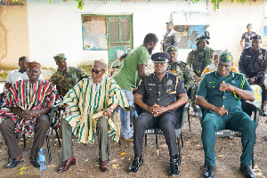 DCOP Francis Yiribaare with members of the Upper West Regional Security Council