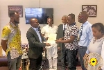 NSA chief, Prof. Peter Twumasi presents certificate of recognition to the Ghana Jiu Jitsu Federation