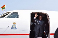 President Nana Addo Dankwah Akufo-Addo wavig from the presidential jet