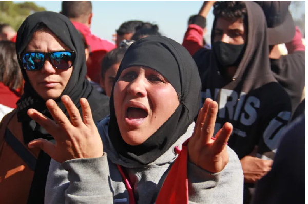 People demonstrate against a rubbish dump in the Tunisian town of Aguereb