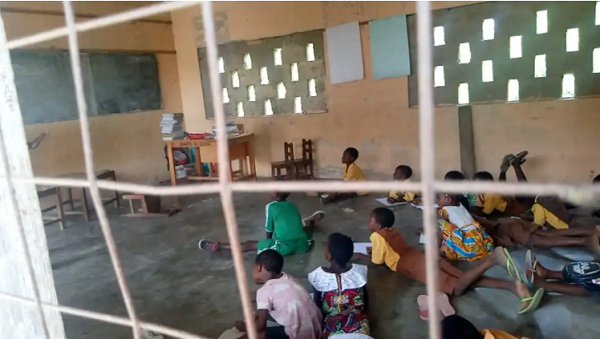 Students studying on the floor