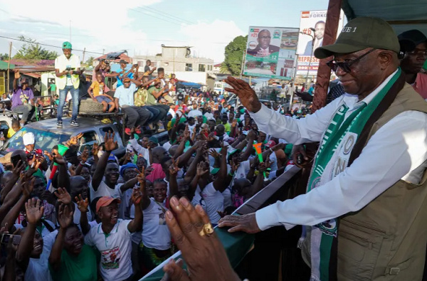Liberia's opposition leader Joseph Boakai of Unity Party waves to his supporters