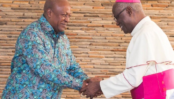 Former president Mahama and Most Rev. John Bonaventure Kwofie,  Metropolitan Archbishop of Accra Arc