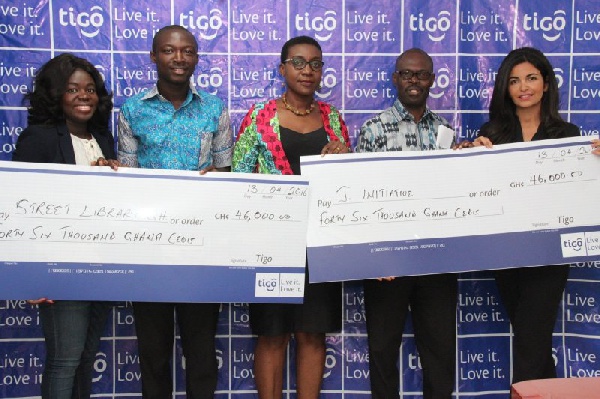 CEO for Tigo Ghana, Roshi Motman presented the cheque to the two organisations