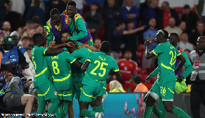 Senegal players celebrating their historic win over England