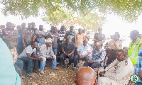 Mohammed Adjei Sowah in a meeting with the scrap dealers