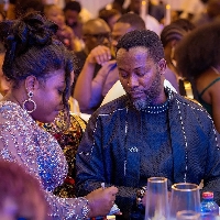 Adjetey Anang with his wife at the launch of his book