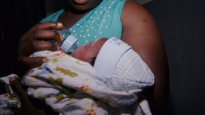 Baby Being Breastfed By Mother. Al Jazeera