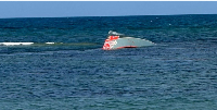 A portion of the capsized vessel floats near Guhere, north of the port town of Obock, Djibouti