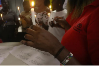 A vigil for women who died from unsafe abortions in Kampala [Sophie Neiman/Al Jazeera]