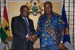 Daniel Yaw Domelevo with Ex President John Dramani Mahama