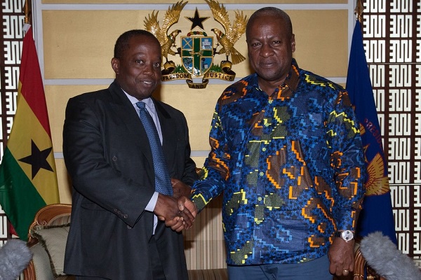 Daniel Yaw Domelevo with Ex President John Dramani Mahama