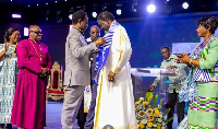 Archbishop Agyinasare (right) taking his new leadership role