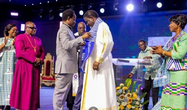 Archbishop Agyinasare (right) taking his new leadership role