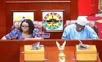 EC Chair, Charlotte Osei in Parliament with a deputy, Amadu Sulley