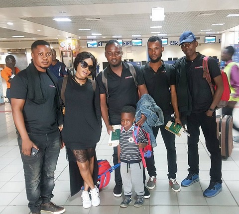Mzbel with her management at the airport