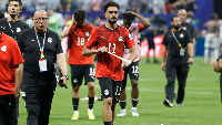 Zico and his teammates walking after the game