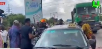 Kwasi Amoako-Atta (in cap) and others helping the victim into a taxi