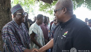 Former President John Mahama in a handshake with Second Deputy Speaker of Parliament Alban Bagbin