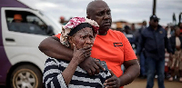 Bekkersdal residents at the scene of the shooting